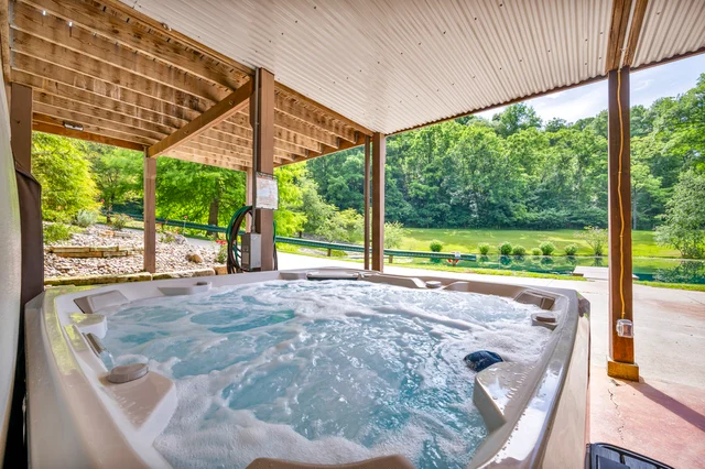 The Main Cabin at The Hideaway | Hot Tub | Ponds #26