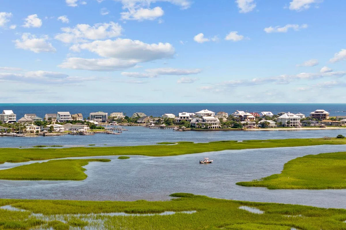 Pop-a-Cork: Waterfront Retreat in Gated Community #166