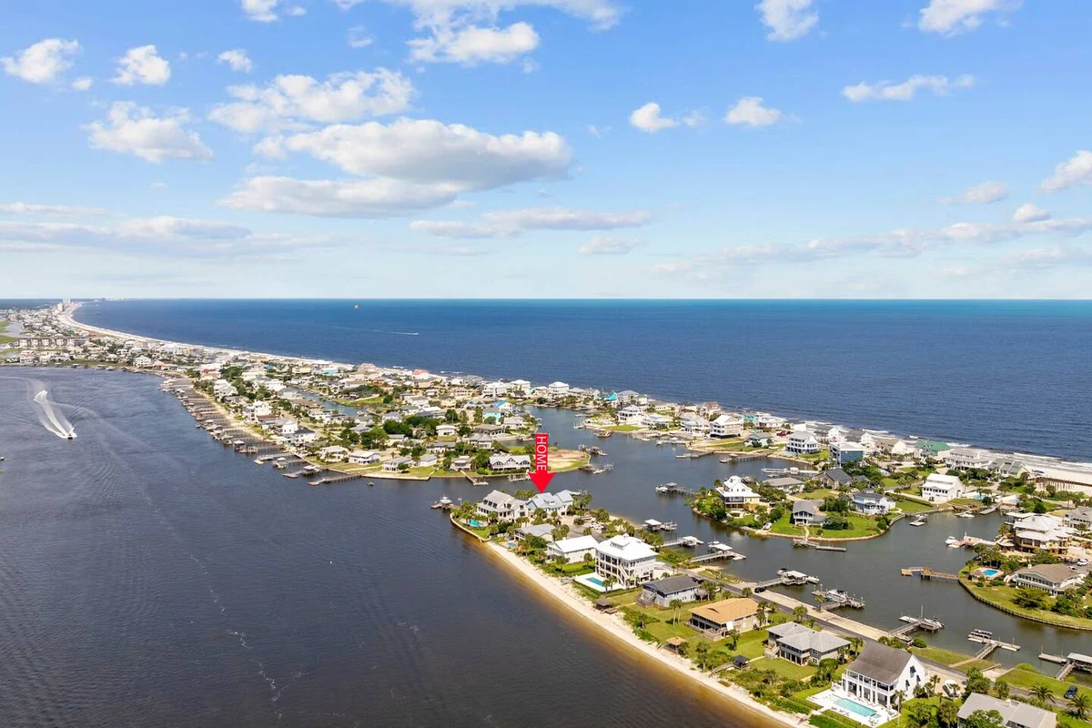 Pop-a-Cork: Waterfront Retreat in Gated Community #185
