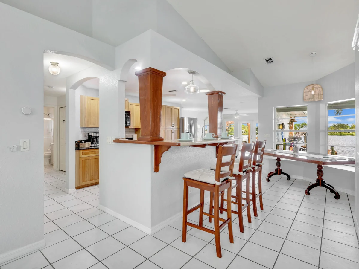 Palm Tree Retreat - Lakefront with Pool & Fire Pit #10