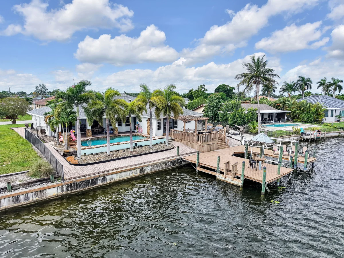 Palm Tree Retreat - Lakefront with Pool & Fire Pit #7