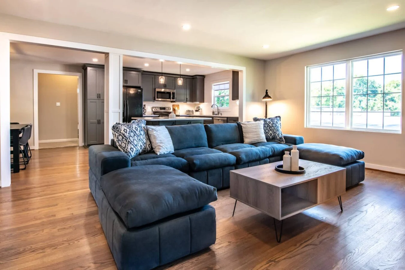 Living room and kitchen of the seven-bedroom Glen Iris house in Birmingham, managed by Wake Up Stays