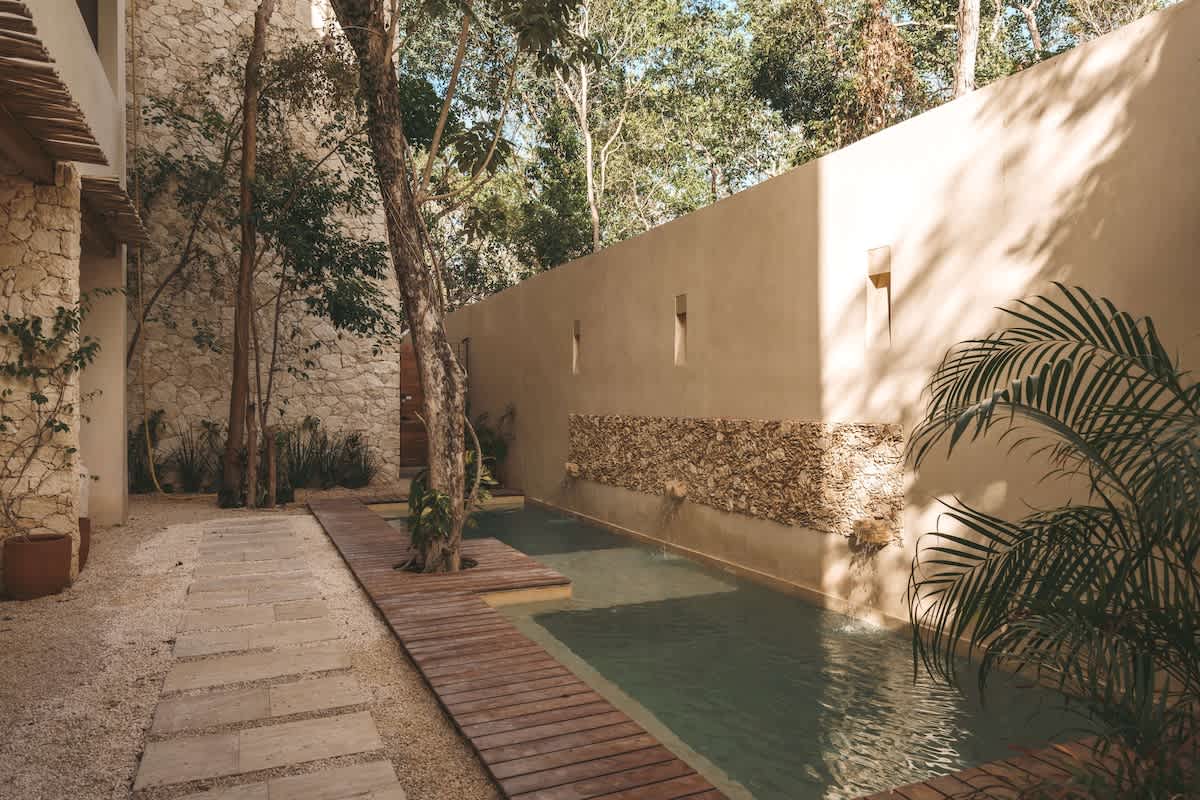 The private plunge pool terrace off the master bedroom at Boutique La Veleta Condo with Private Pool Terrace in Tulum