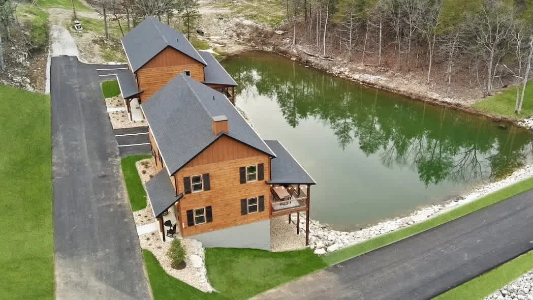 Close to pools, overlooks water, gorgeous cabin property photo 1