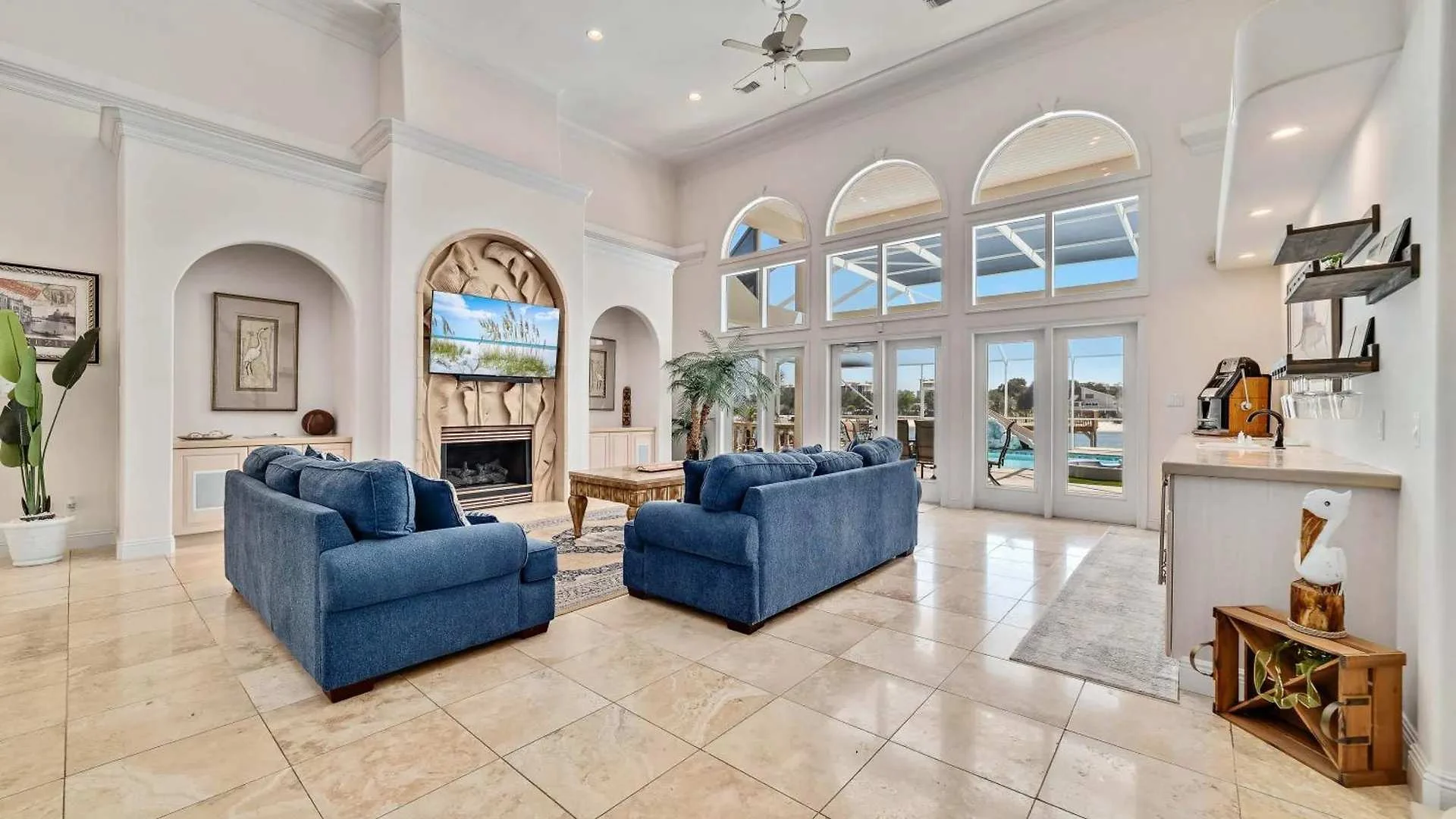 Waterfront vacation rental with grand living room and pool views, Pensacola