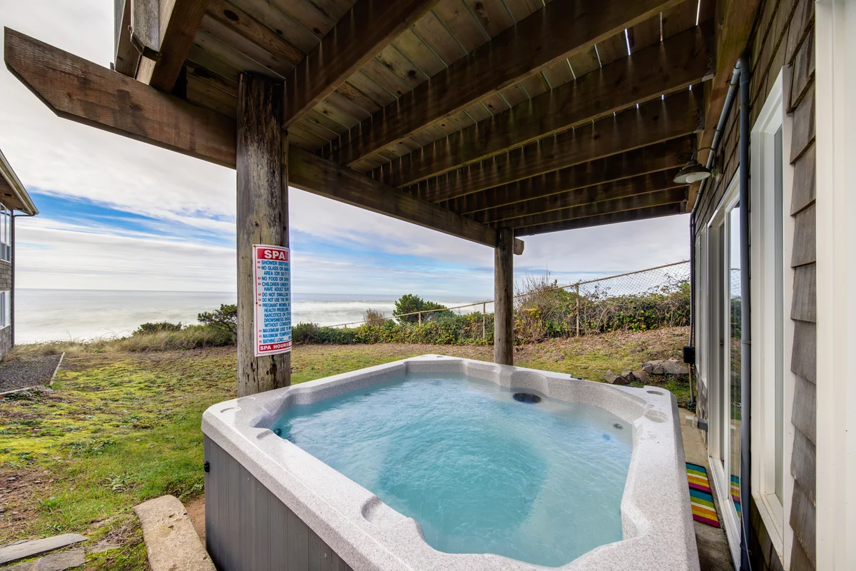 Bella Beach home with ocean view gas fireplace beach access and private hot tub property photo 2
