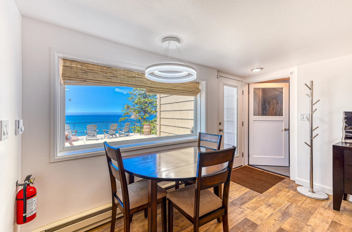 Quaint ocean view escape with modern interior smart TV and gorgeous deck property photo 4