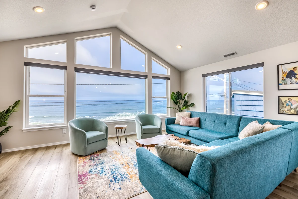 Oceanfront dog friendly home with hot tub and huge view steps to beach access property photo 1