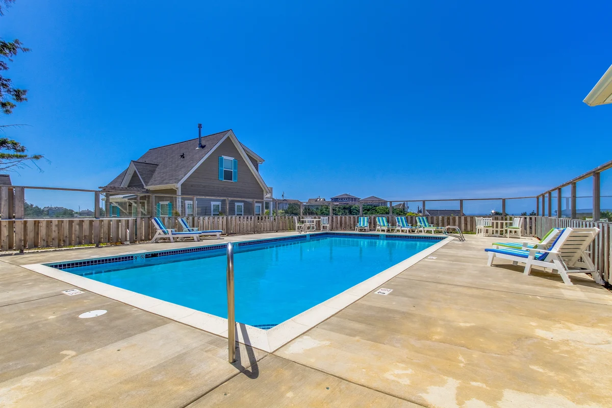 Beautiful family friendly home with private hot tub walk to beach shared pool property photo 3
