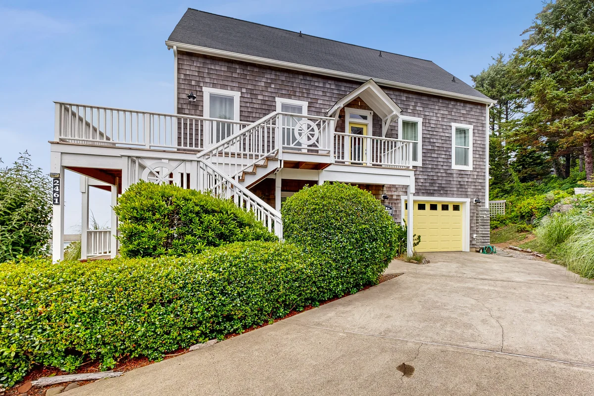 Ocean view home with hot tub game room furnished deck and fireplaces property photo 1