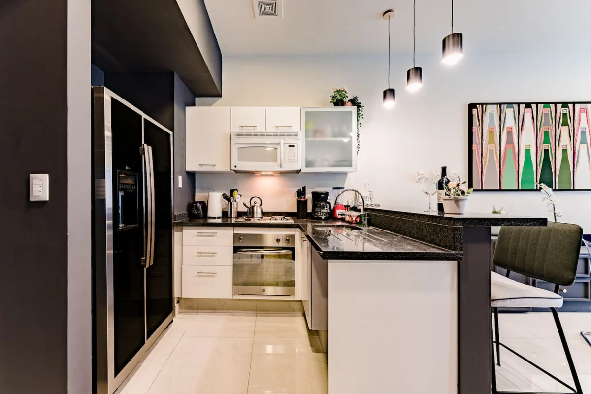 Stylish Reforma Loft w/Pool, Gym, AC & City Views property photo 5