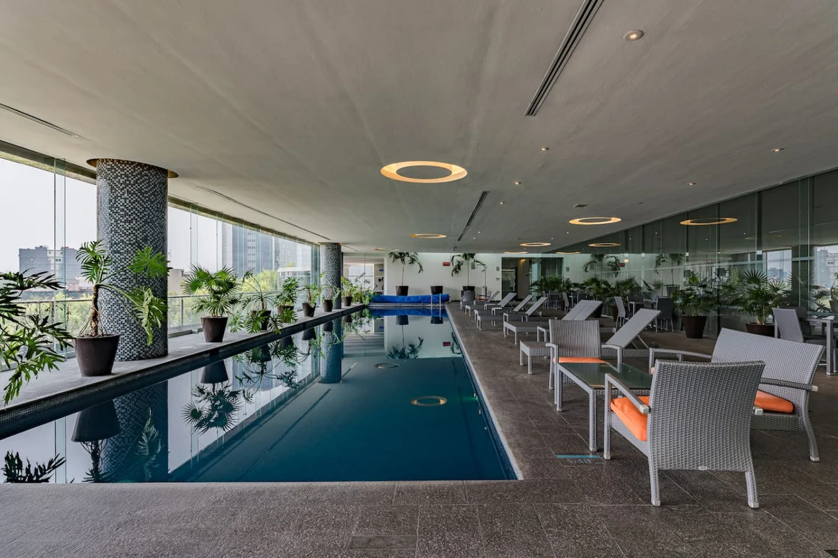 Stylish Reforma Loft w/Pool, Gym, AC & City Views property photo 4