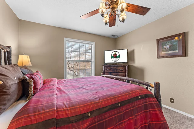 Upstairs Bedroom 3 King Bed, TV, Deck Access, Shared Bath image 1